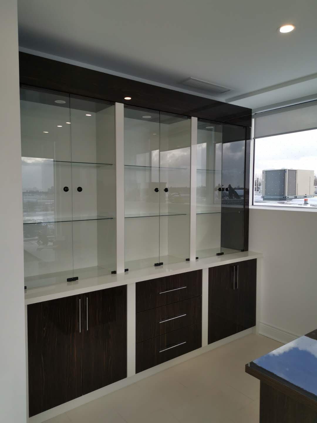 Commercial Build - Glass Shelving Cabinetry and Inhouse Customize Sizing Desk