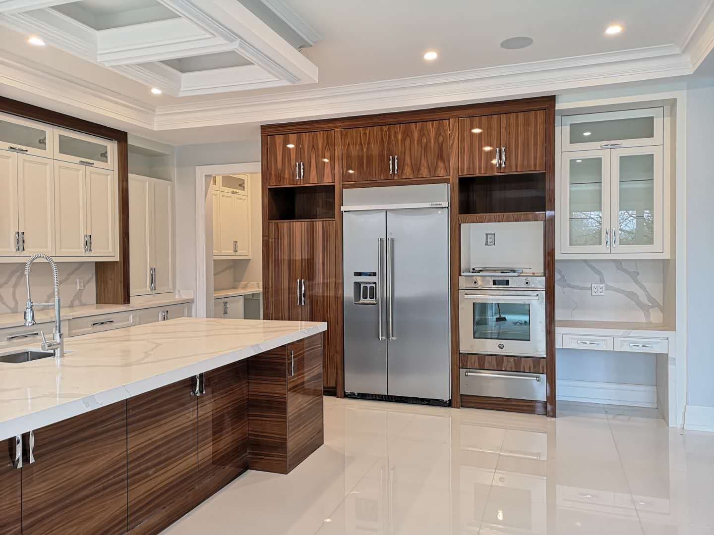 Modern Kitchen Featuring Contrast Accent Walnut High Gloss Cabinetry and Special Design Hood