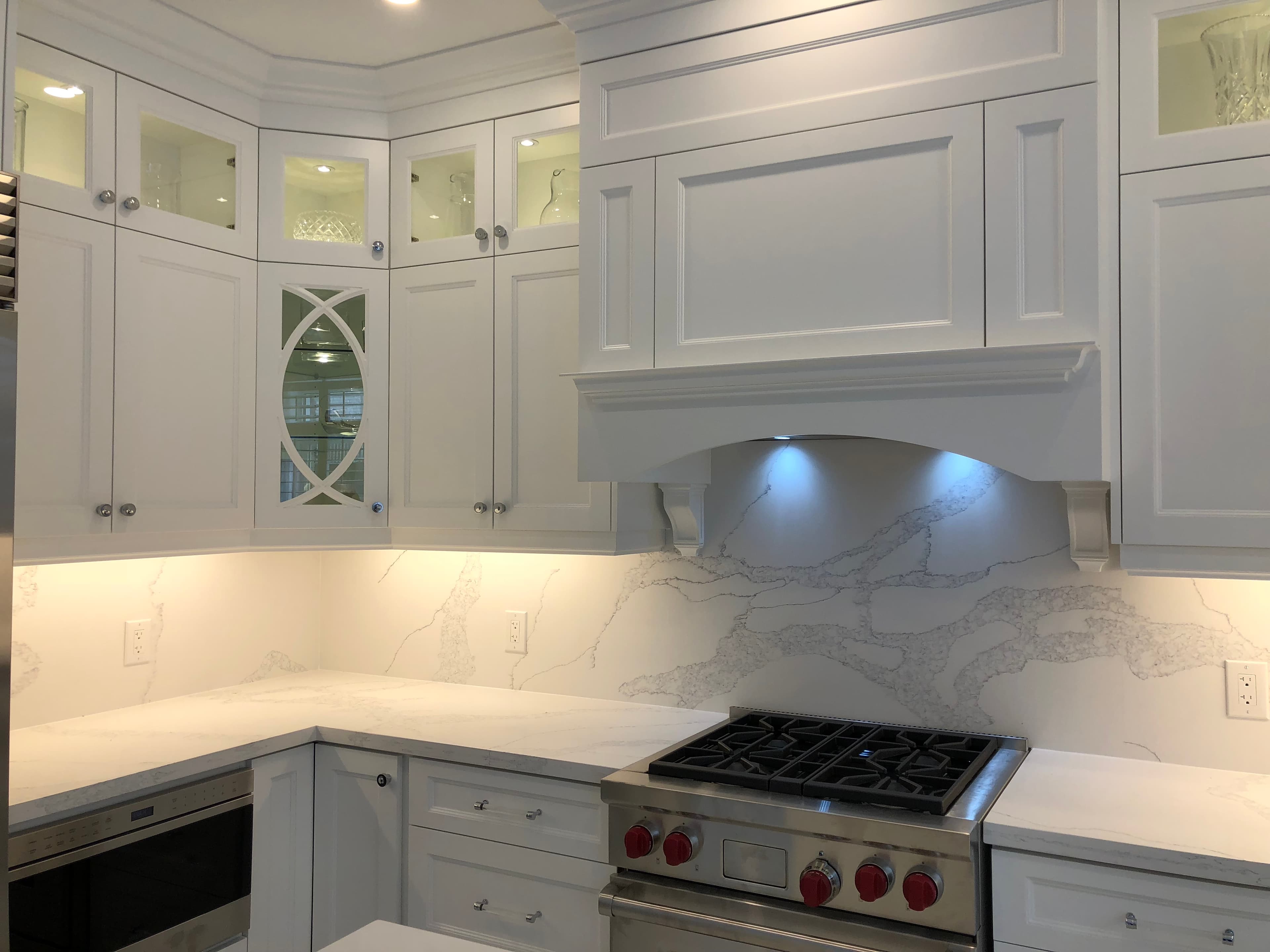Transitional Kitchen - Corner Glass Fish Door, Ceiling Cabinet Pot Light, And Square Island Wine Rack
