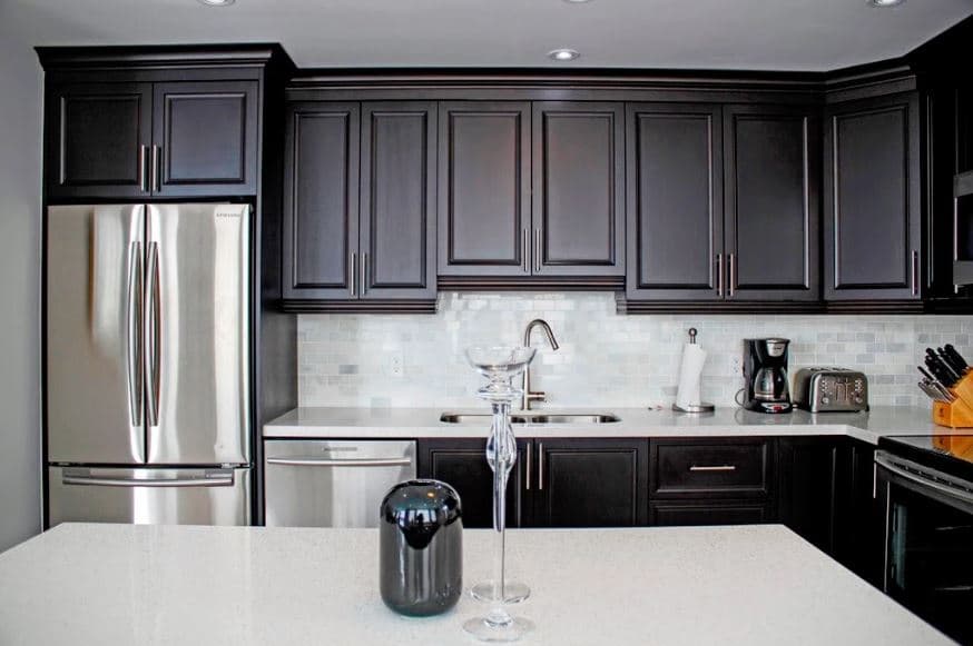 Transitional Kitchen Featuring L Shape Kitchen Design Paired With Float Out Countertop Central Island