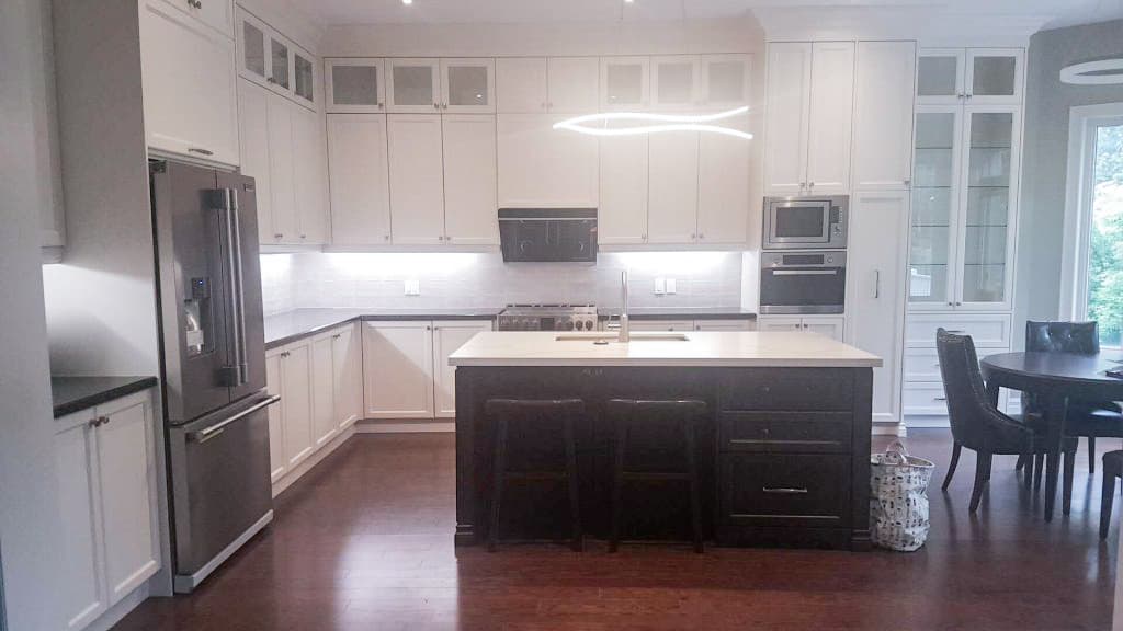 Transitional Kitchen Featuring Multi Function Central Island