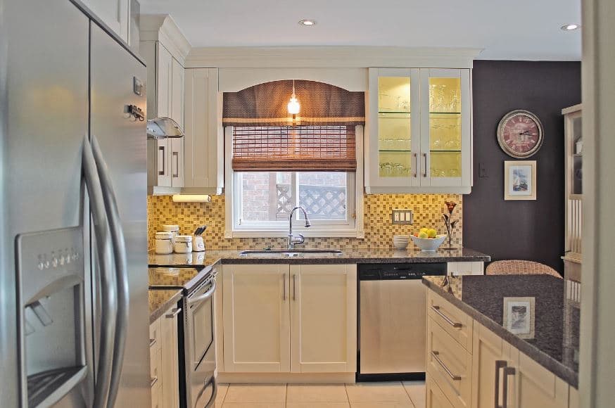 Transitional Kitchen - Weight Bearing Column Design and Sectional Upper Cabinets