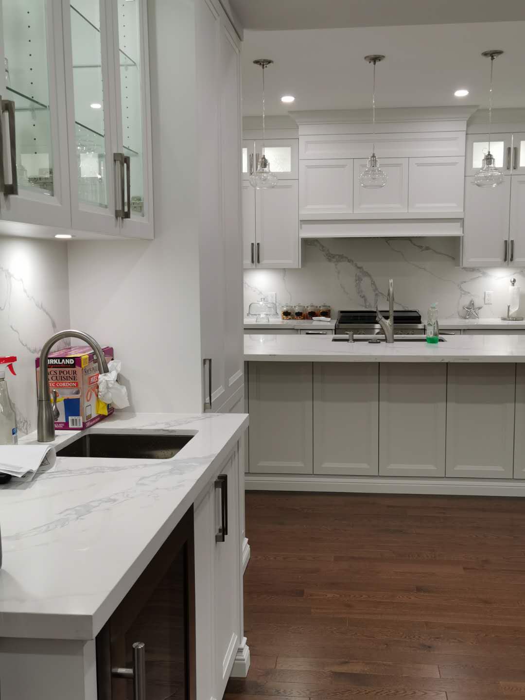 Transitional/Modern Kitchen Feature All White Cabinetry Finish