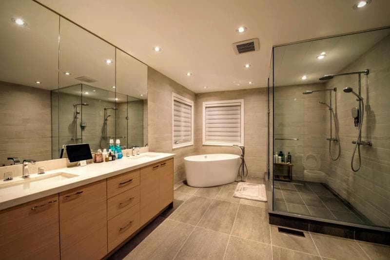 Vanity Unit Featuring Wood Grain Finish Cabinetry and Duo Sinks