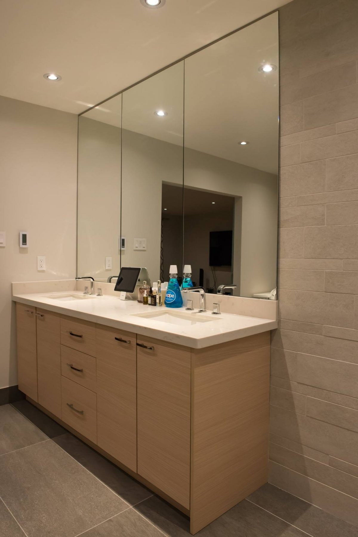 Vanity Unit Featuring Wood Grain Finish and Duo Sinks