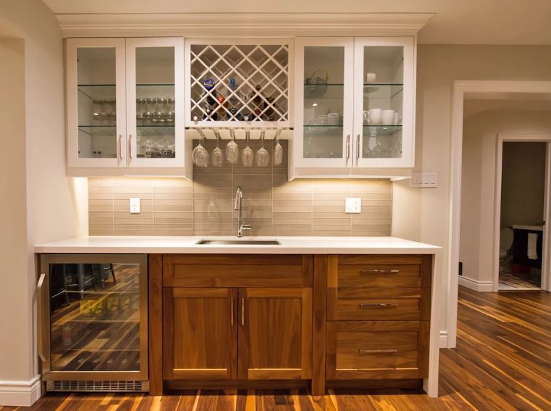 White upper wood bottom with wine rack and glass holder, sink in the middle
