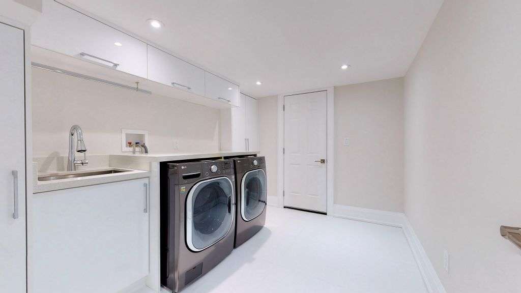 Laundry Room with Extra Large Cabinets Design for Storage